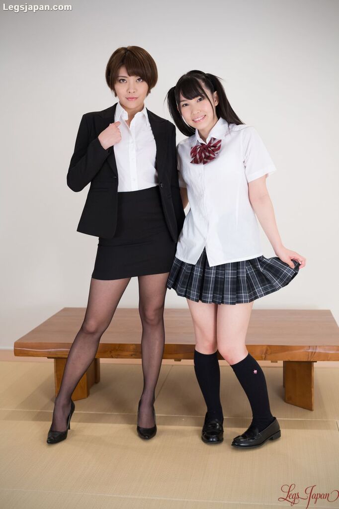 Tutor and student standing beside bench high heels